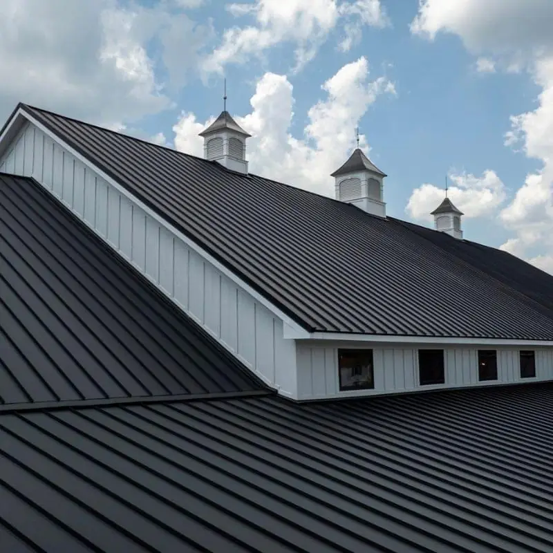 Standing seam metal roof next to a concrete tile roof on San Jose homes